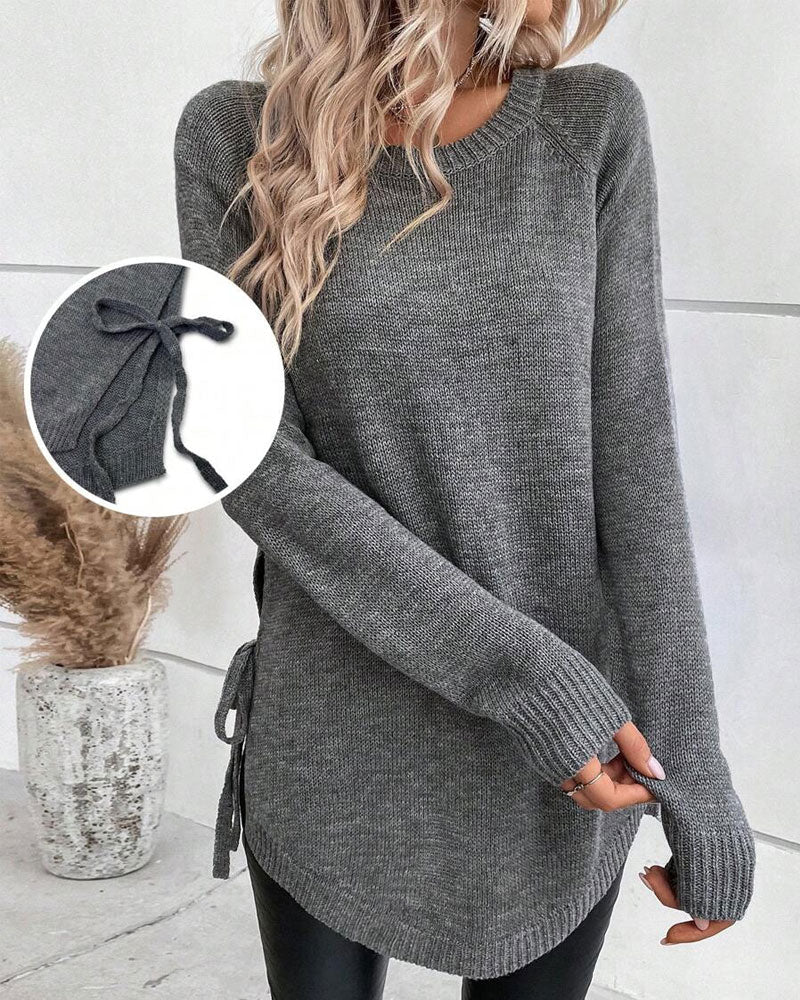 Sweter z rękawami reglanowymi i wiązaniem z boku