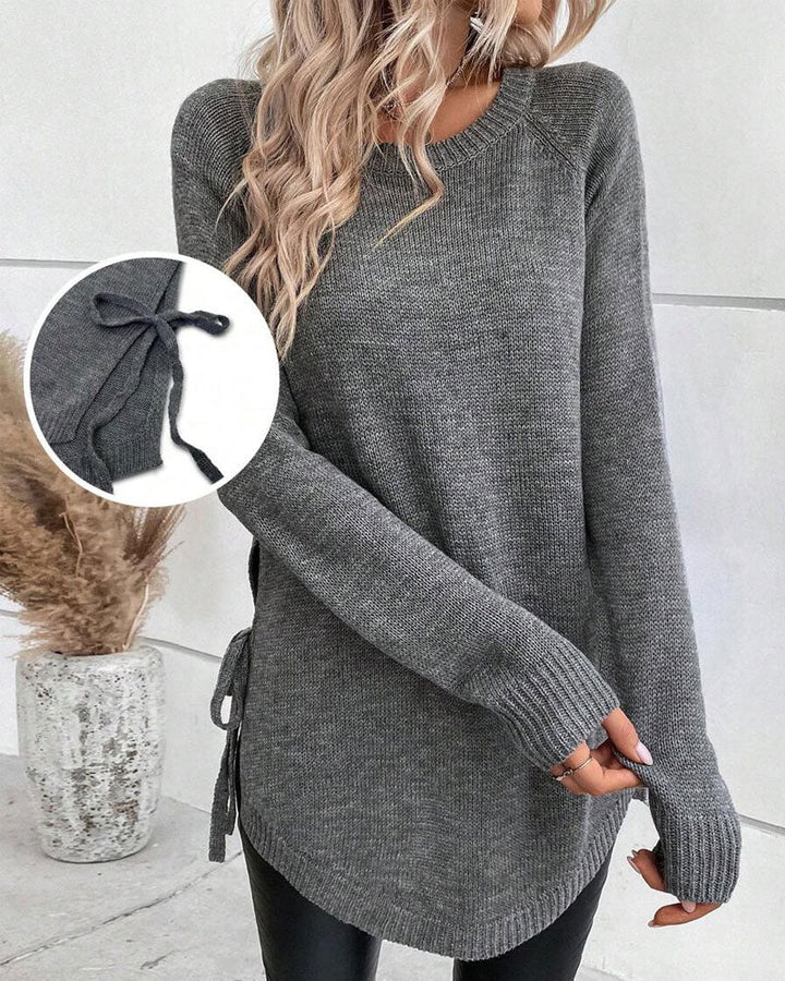 Sweter z rękawami reglanowymi i wiązaniem z boku