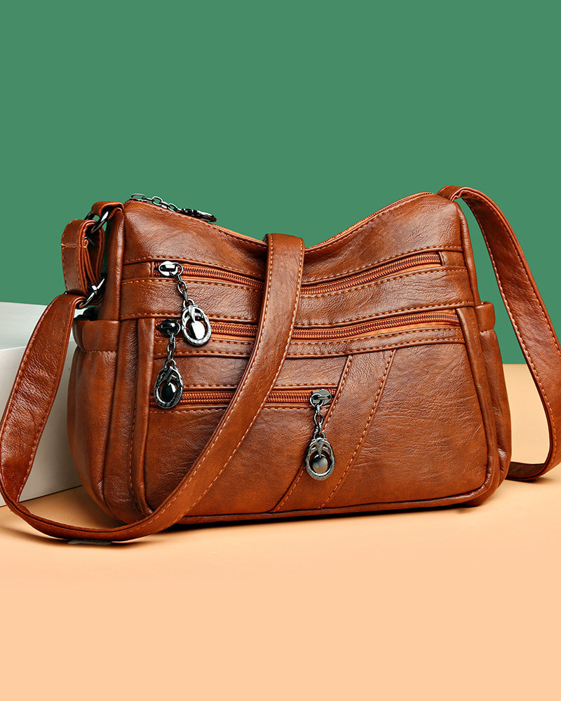 Sac bandoulière en cuir souple avec multipoches
