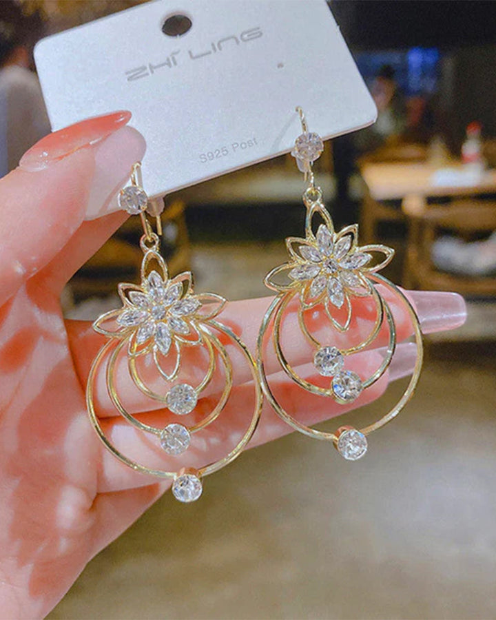 Boucles d'oreilles trois créoles lotus en cristal