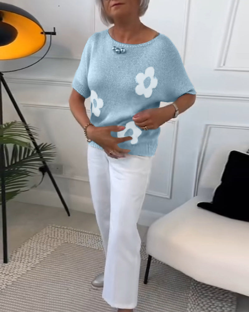 Dopasowany sweter z okrągłym dekoltem w kwiaty