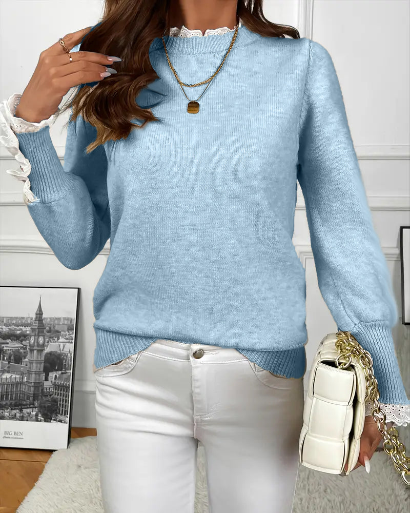 Elegancki sweter zdobiony koronką