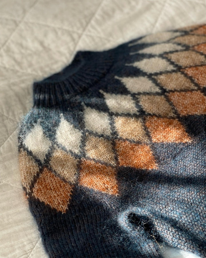 Pull à jacquard losange géométrique