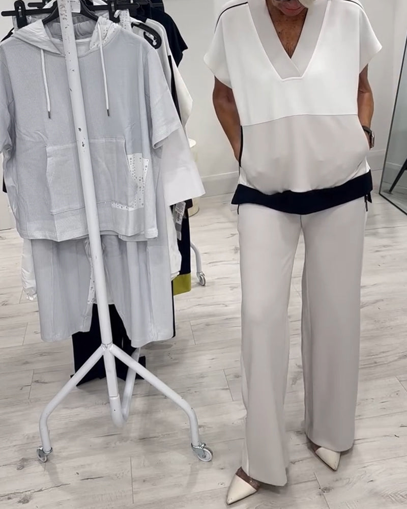 Dopasowany zestaw z dekoltem w serek i rozcięciem, styl casual