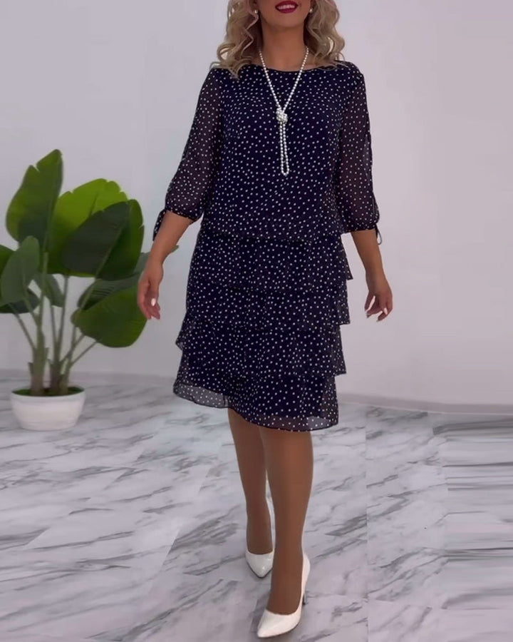 Robe élégante superposée à imprimé pois