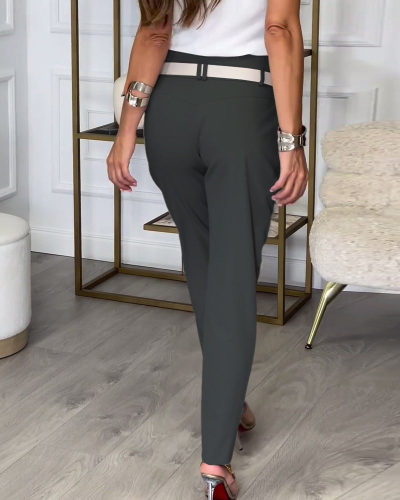 Pantalon patchwork irrégulier à poches de couleur unie à la mode