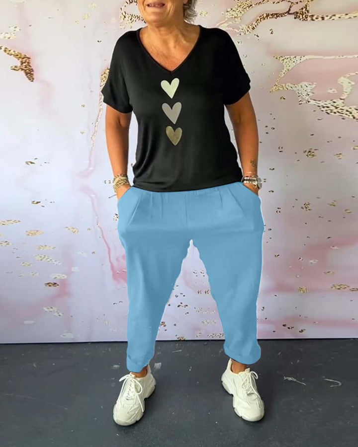 Wygodne spodnie typu casual z kieszenią w jednolitym kolorze