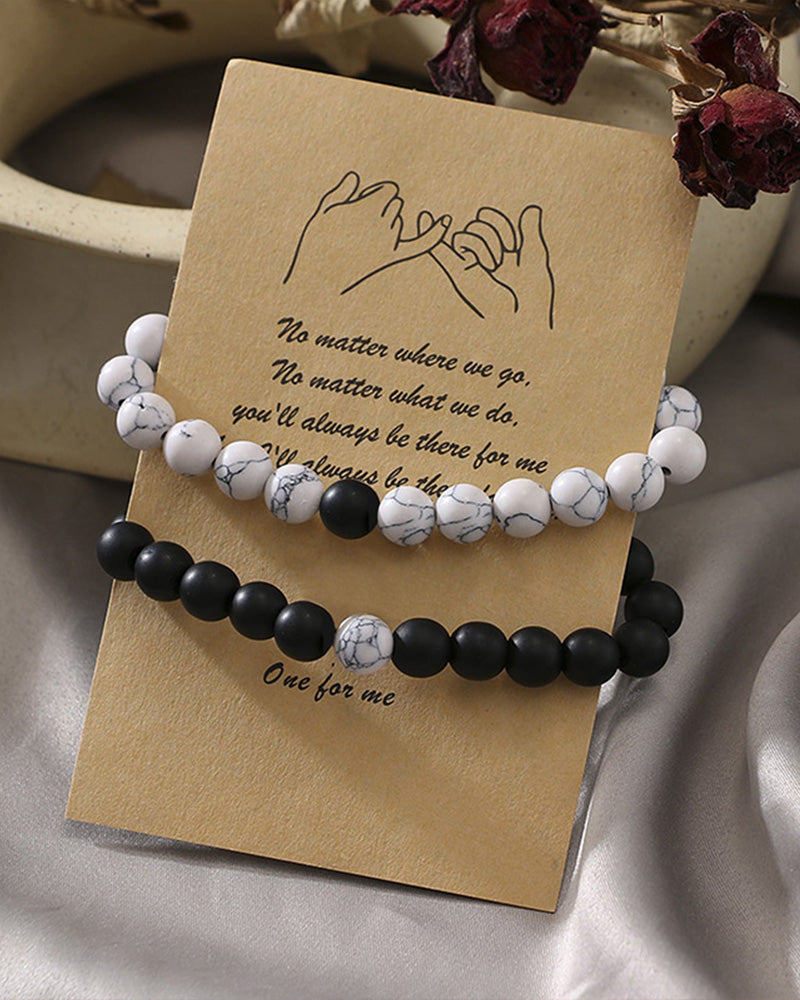 Ensemble de bracelets pour couple tissés en perles noires et blanches