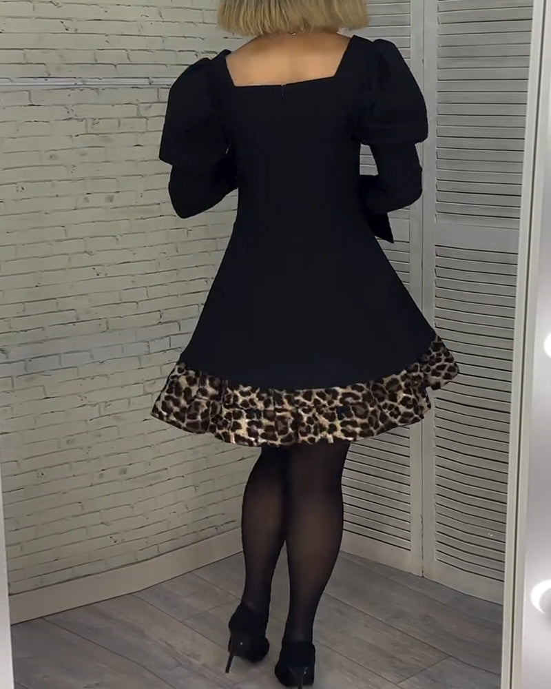 Robe élégante à manches bouffantes et imprimé léopard