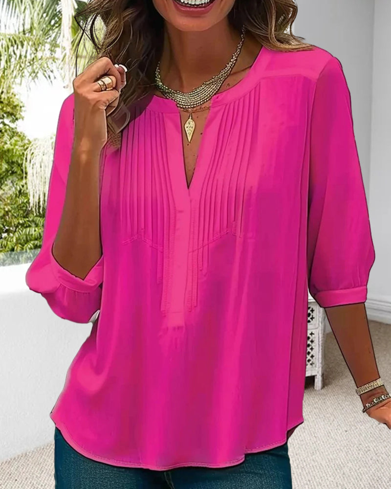 Blouse unie plissée col V