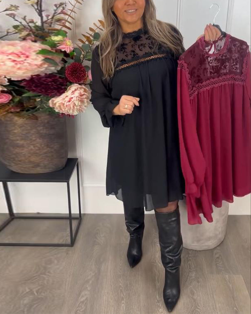 Sukienka z koronkowym wycięciem, bufiastymi rękawami i eleganckim krojem