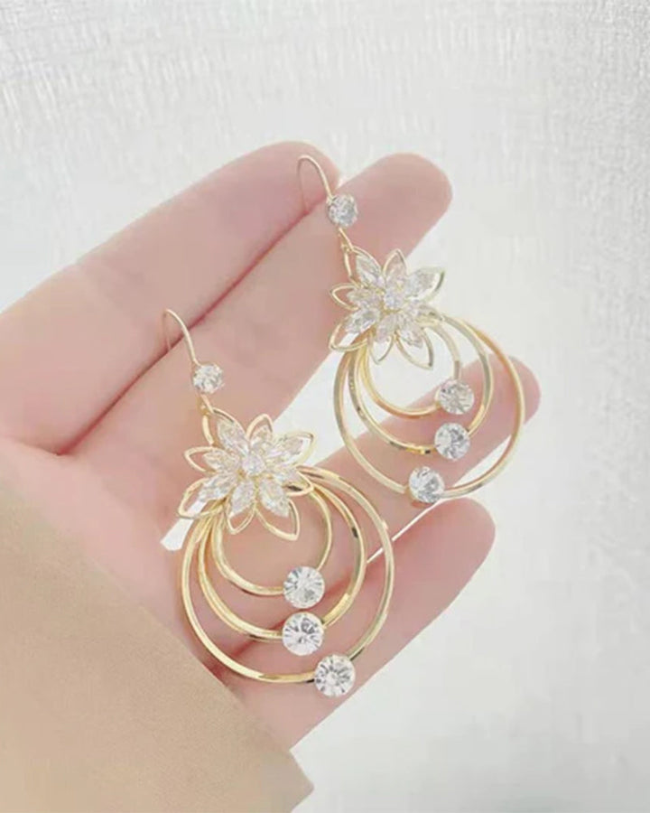 Boucles d'oreilles trois créoles lotus en cristal