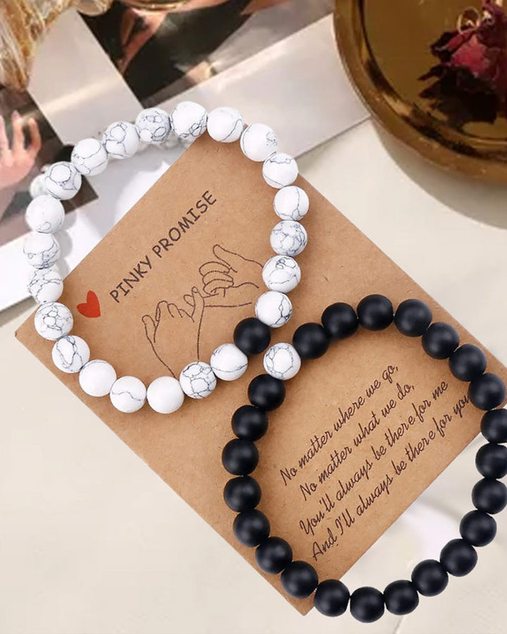 Ensemble de bracelets pour couple tissés en perles noires et blanches