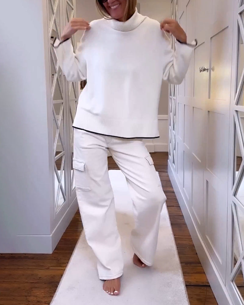 Pull avec le cou haut et les manches longues