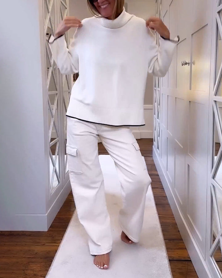 Pull avec le cou haut et les manches longues