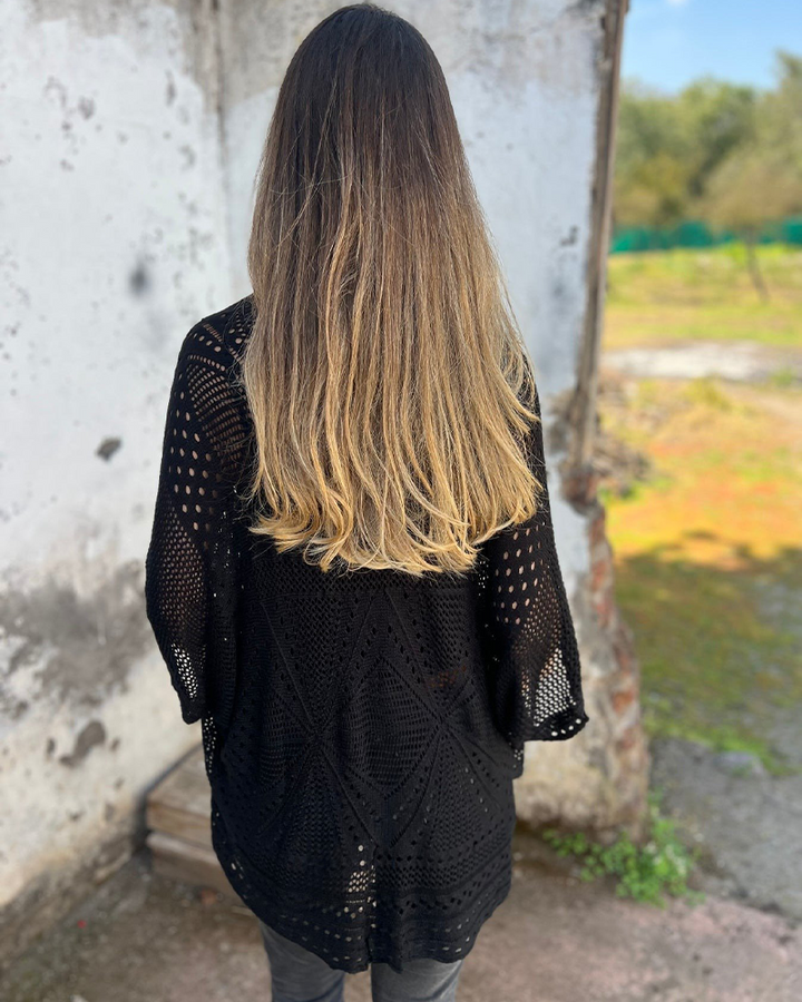 Manteau élégant avec design en tricot ajouré