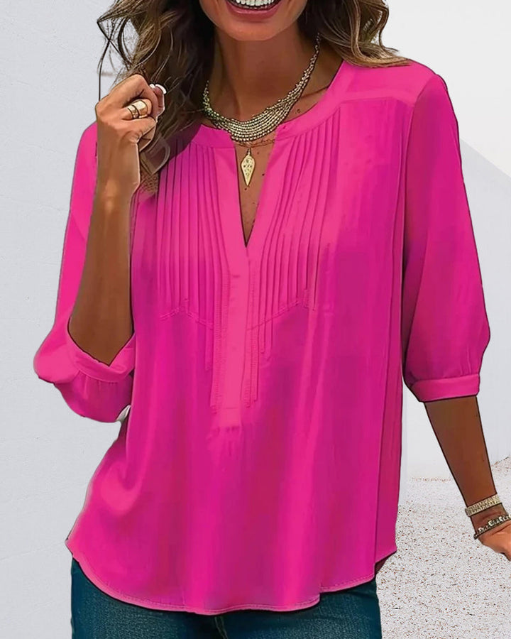 Blouse unie plissée col V