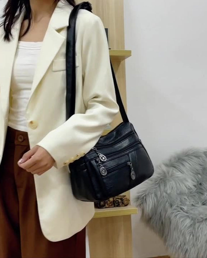 Sac bandoulière en cuir souple avec multipoches