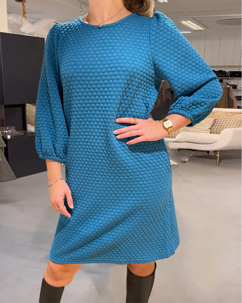 Robe élégante de couleur unie