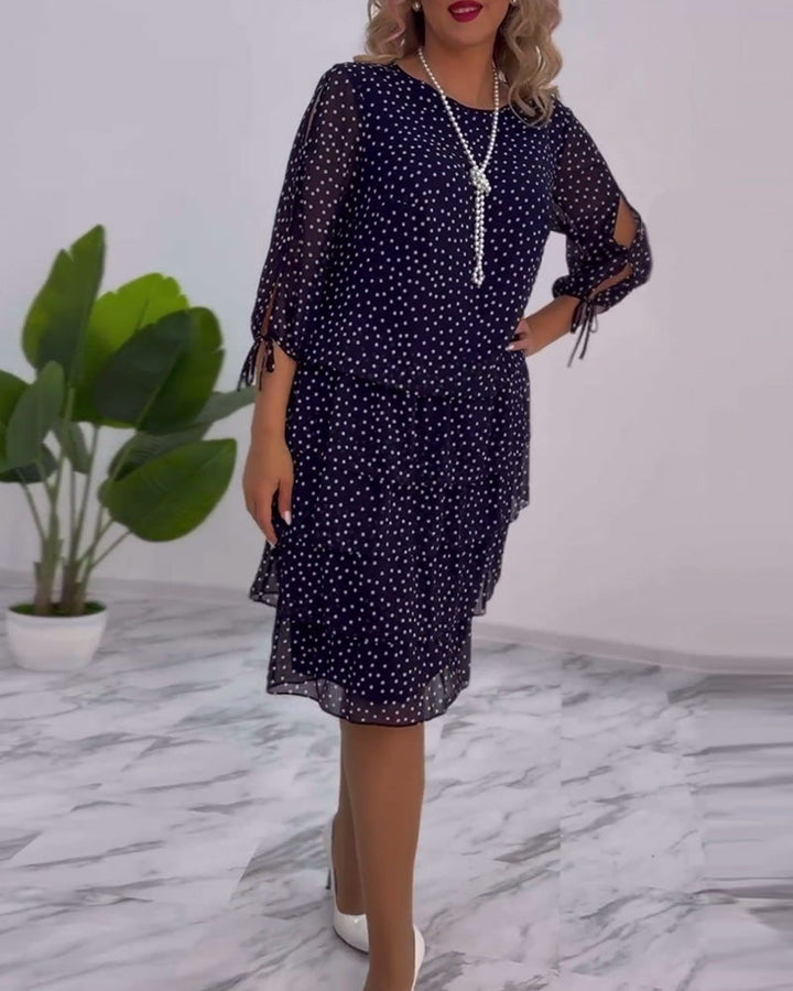 Robe élégante superposée à imprimé pois