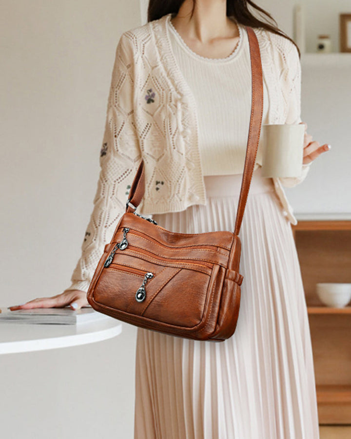 Sac bandoulière en cuir souple avec multipoches