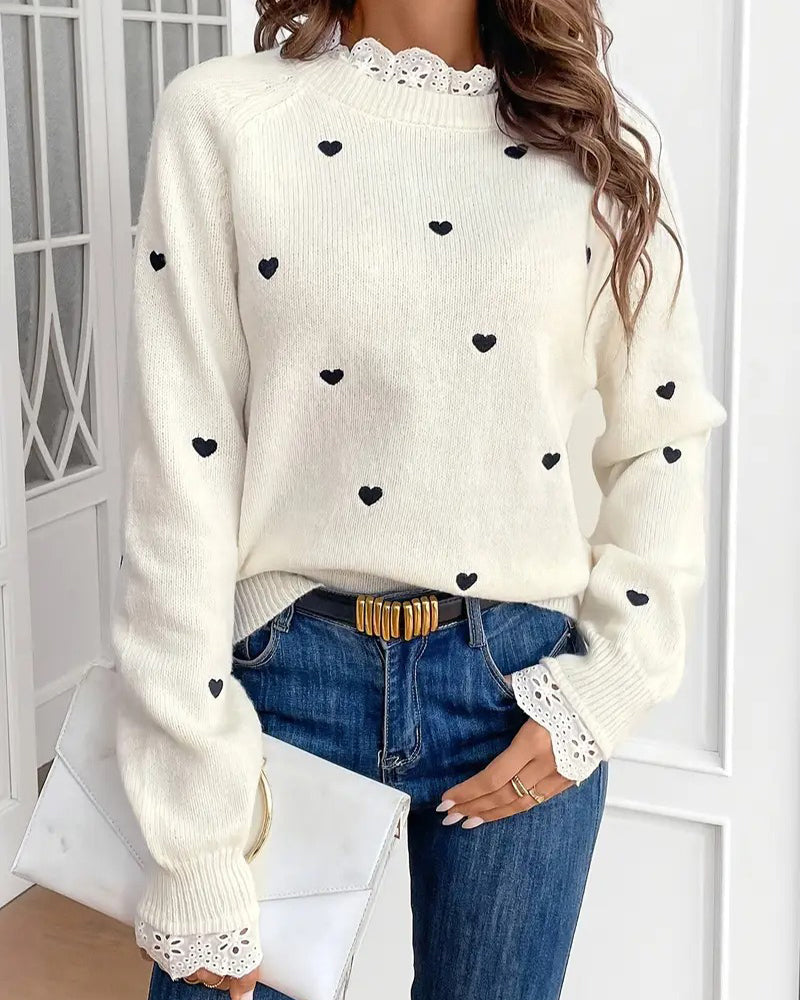 Modny sweter o kroju oversize z motywem serca