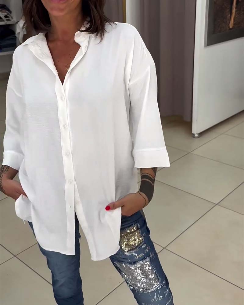 Chemise boutonnée de couleur unie à revers