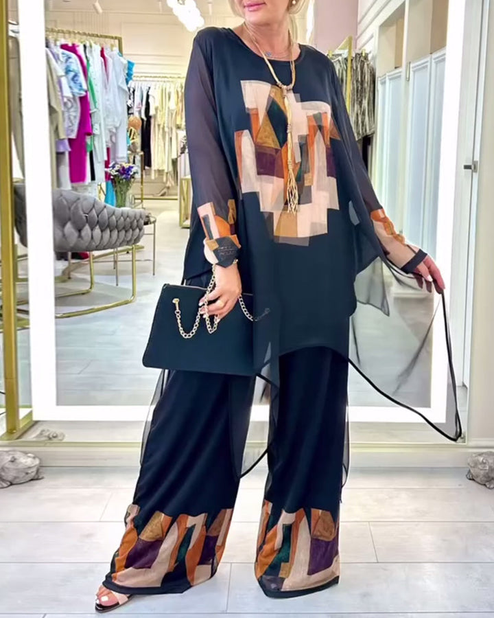 Elegancki kombinezon z długim rękawem, wzorzysty, z szerokimi nogawkami