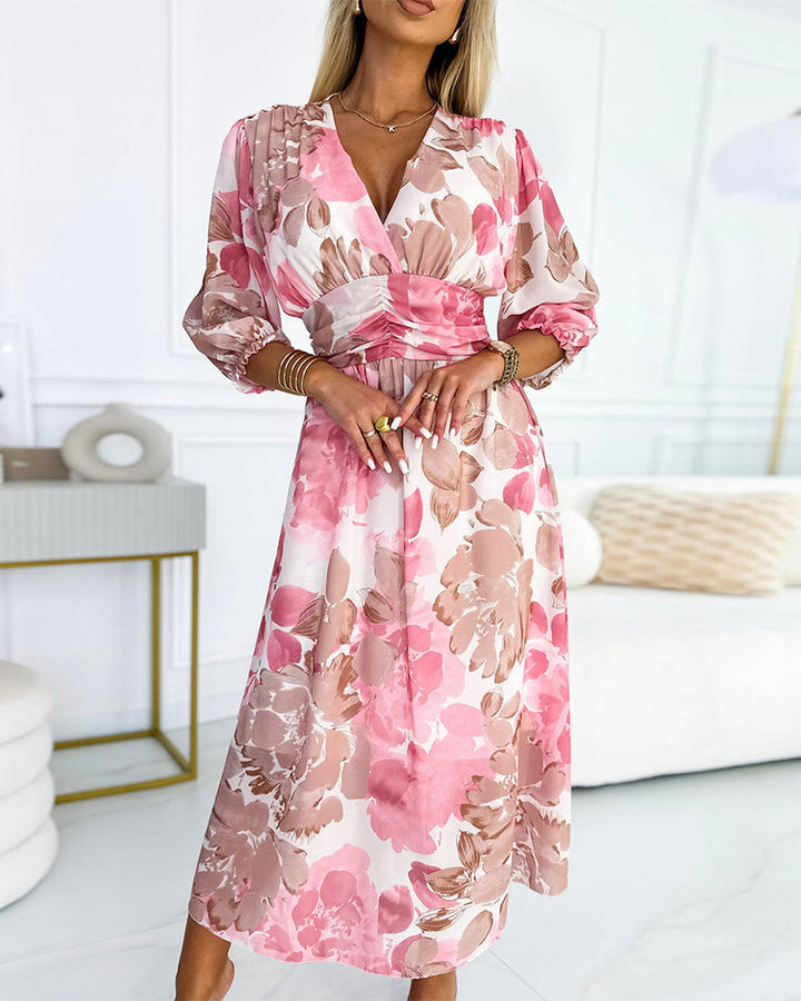Robe à imprimé floral avec col en V et manches trois-quarts