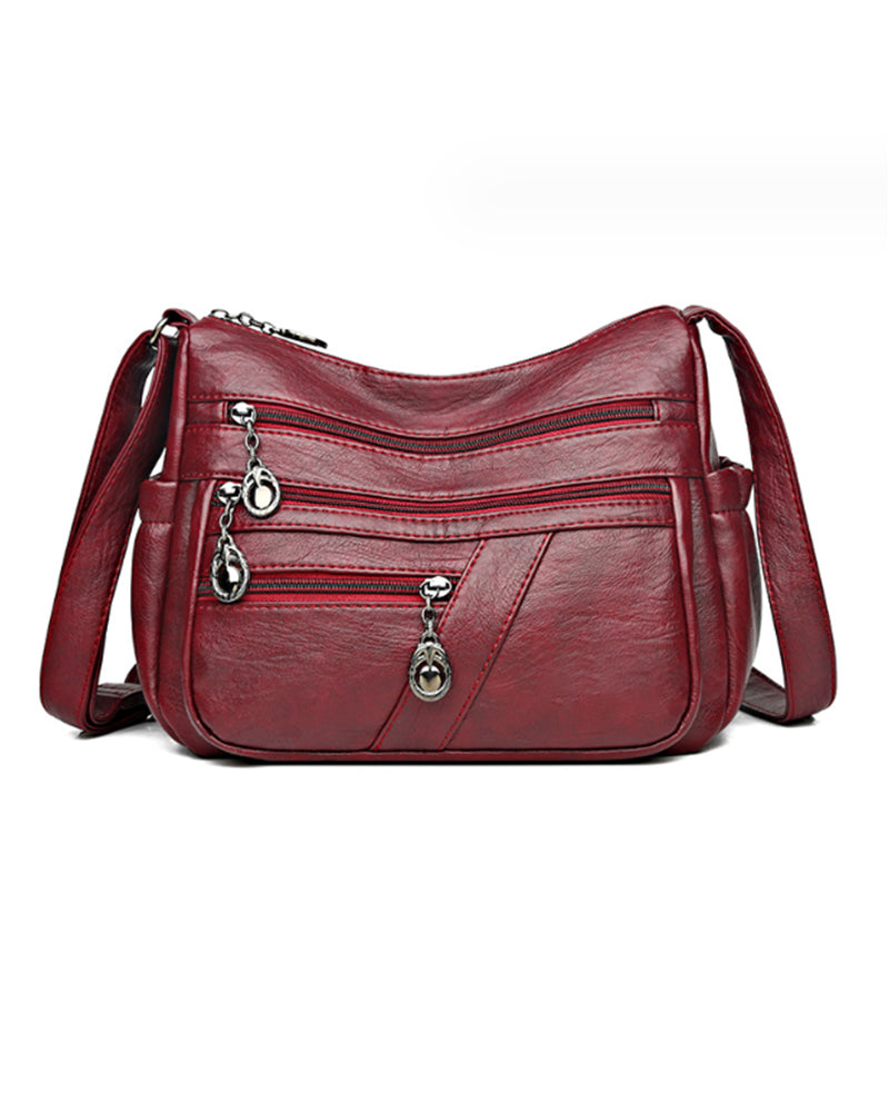 Sac bandoulière en cuir souple avec multipoches