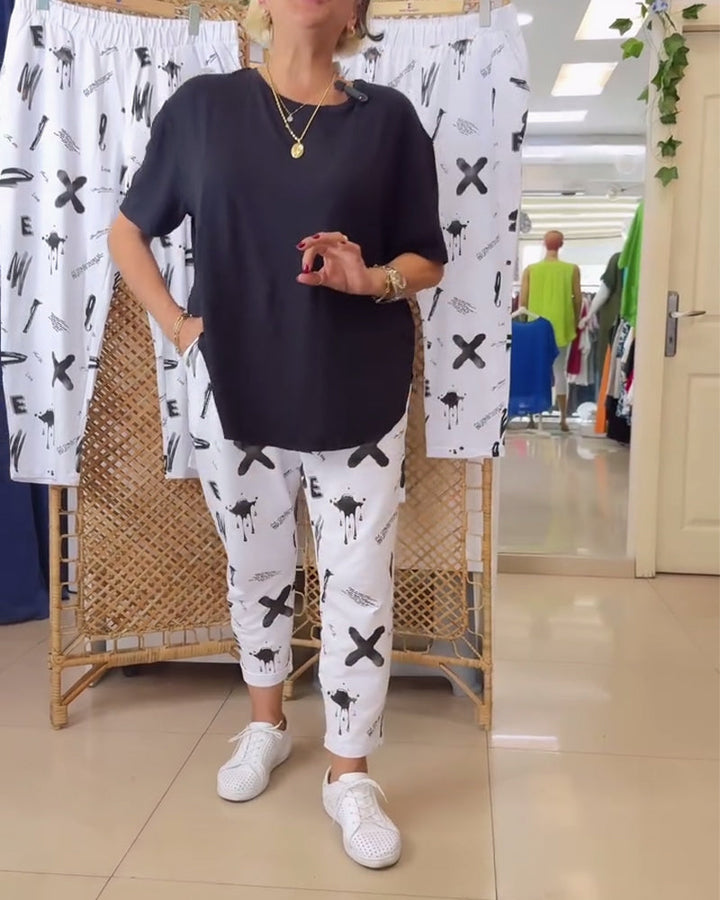 Spodnie o średnim stanie, luźny krój, z nadrukiem
