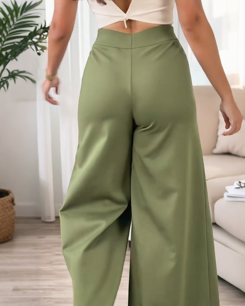 Spodnie o kroju kopertowym, szerokie nogawki, styl casual