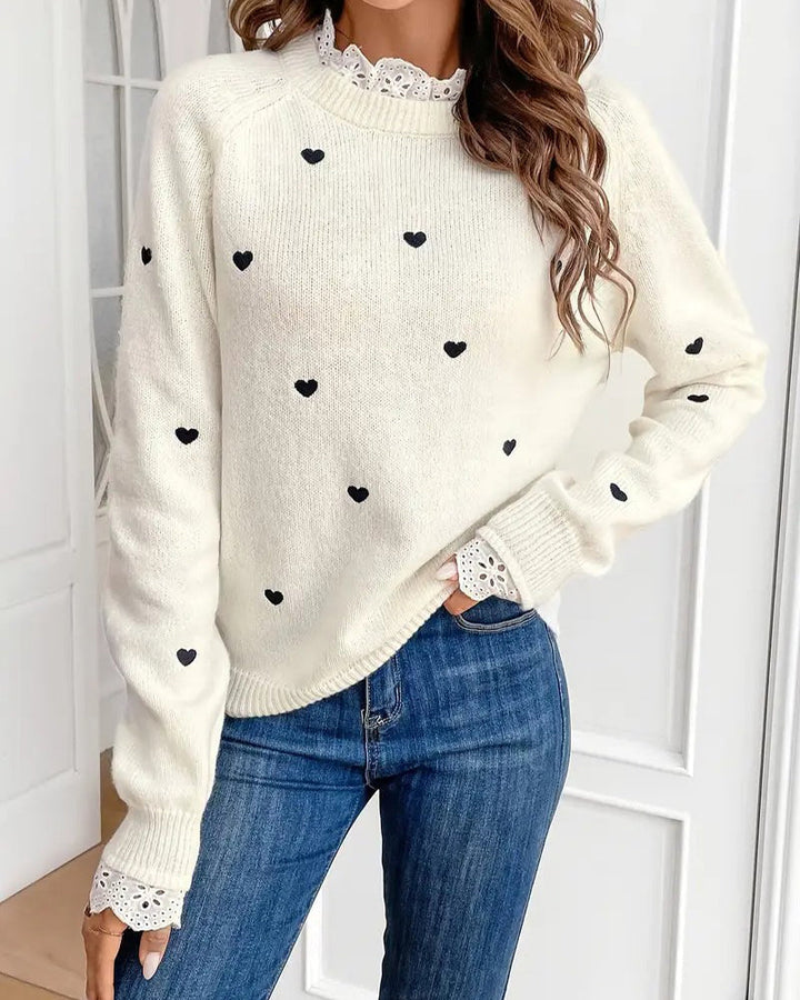 Modny sweter o kroju oversize z motywem serca