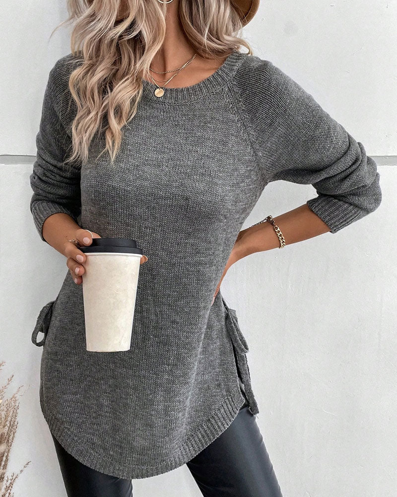 Sweter z rękawami reglanowymi i wiązaniem z boku