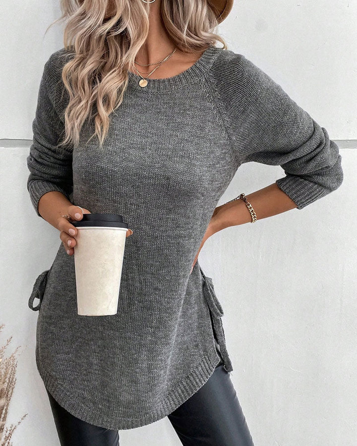 Sweter z rękawami reglanowymi i wiązaniem z boku
