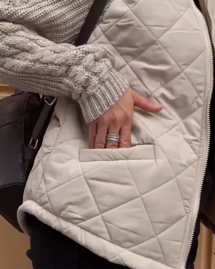 Manteau zippé à col haut de couleur unie