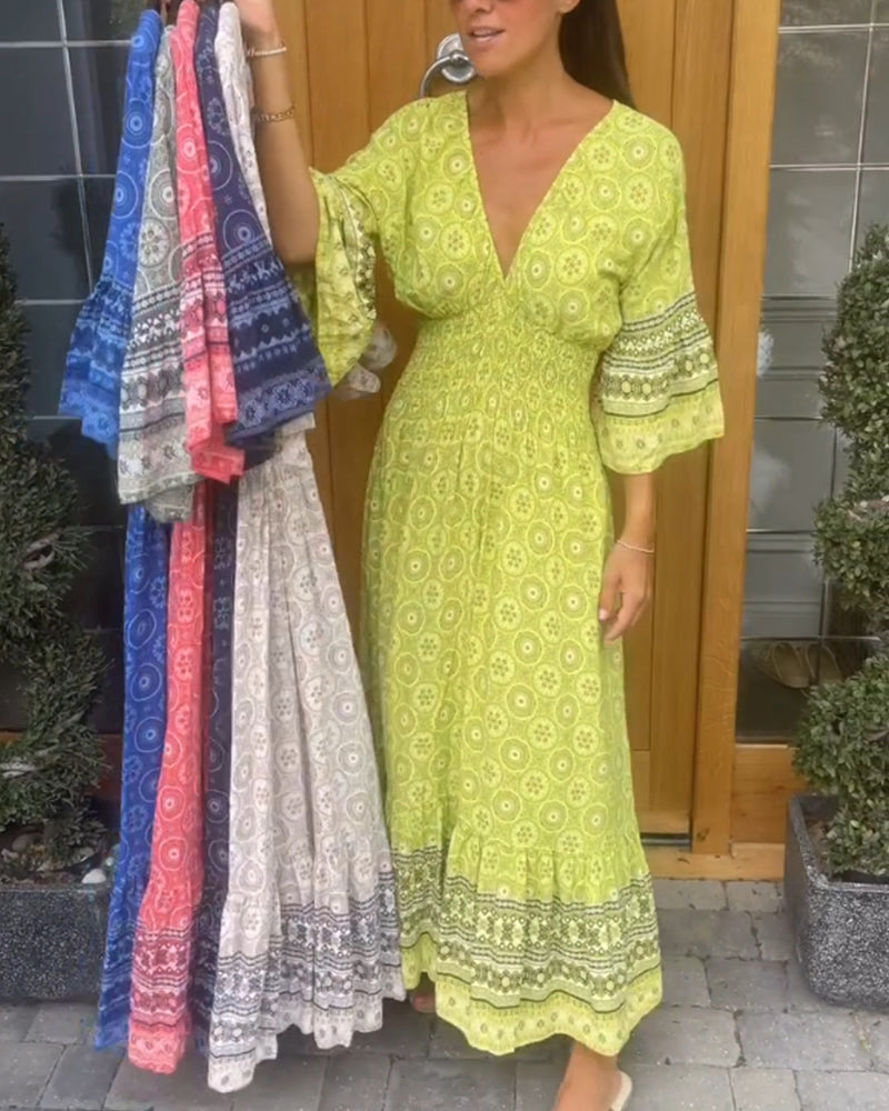 Robe longue à manches évasées en V profond