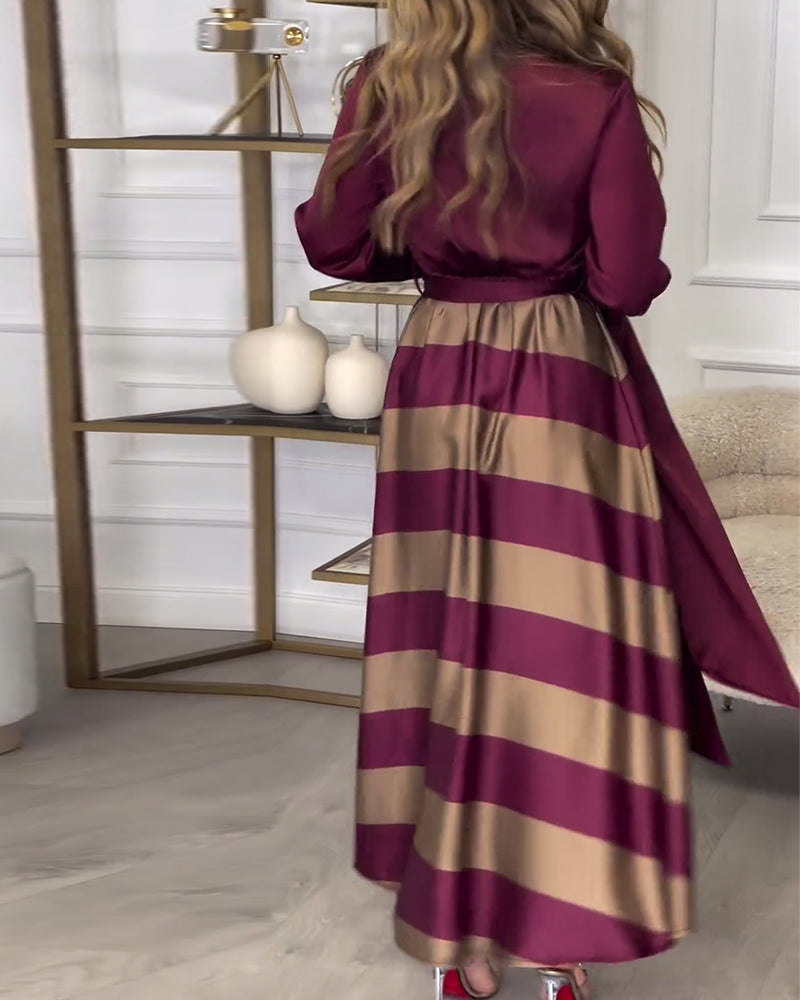 Robe élégante à rayures et à bretelles