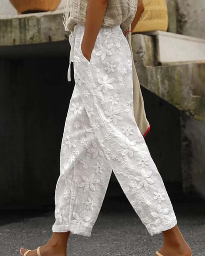 Pantalon décontracté de couleur unie à lacets brodés de fleurs