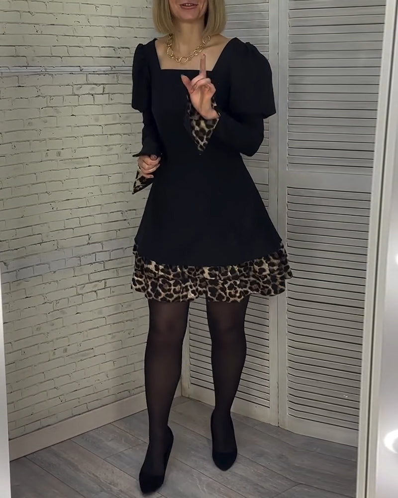 Robe élégante à manches bouffantes et imprimé léopard